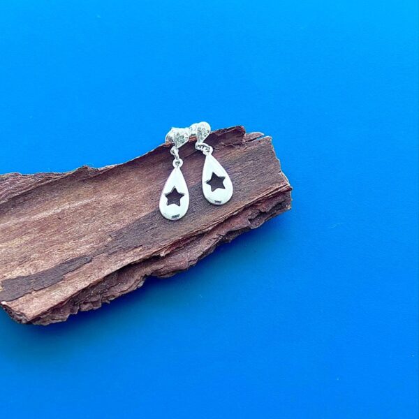 BRINCO PENDURADO ESTRELA VAZADA - PRATA  925