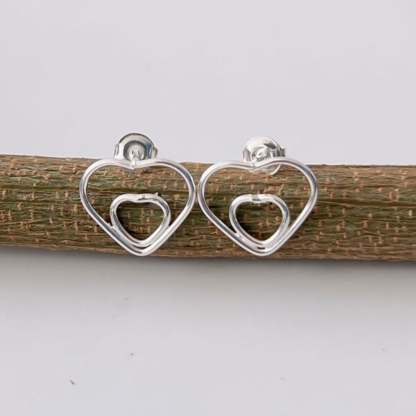 BRINCO CORAÇÃO DUPLO - PRATA 925