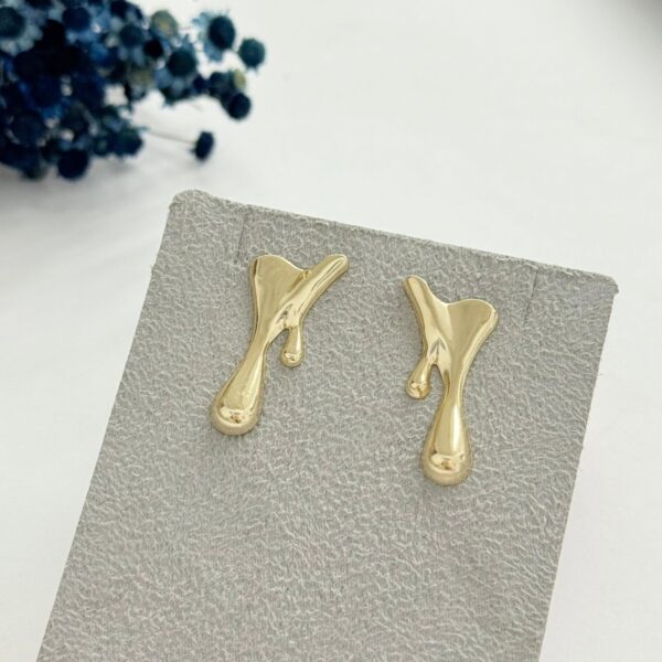 BRINCO ABSTRATO - FOLHEADO OURO 18K