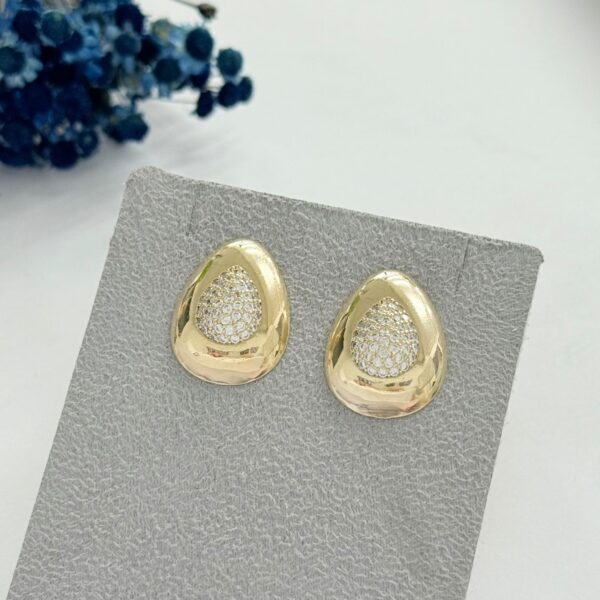 BRINCO OVAL - FOLHEADO OURO 18K