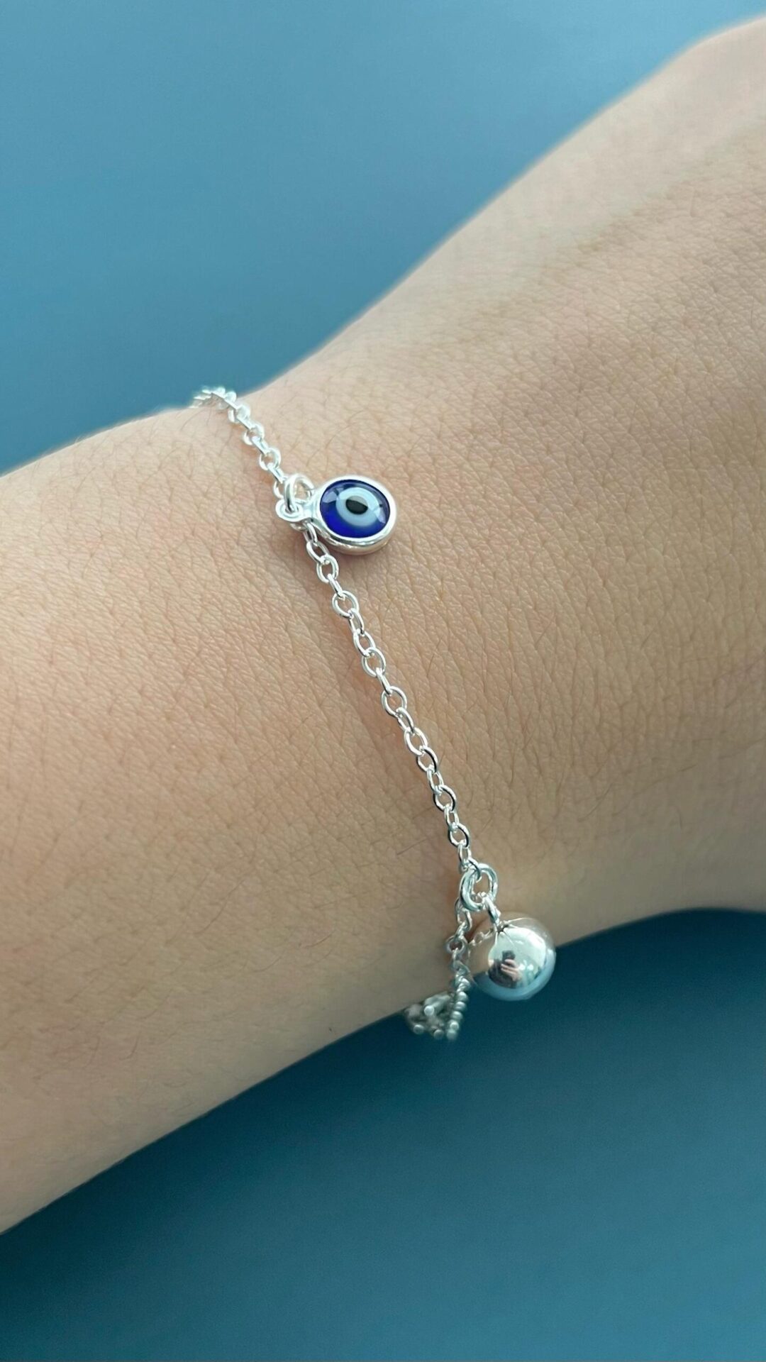 15252591714-whatsapp-image-2024-02-19-at-16-48-22-1.jpeg PULSEIRA OLHO GREGO COM BOLINHAS - PRATA 925