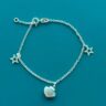 15252699843-whatsapp-image-2024-02-20-at-09-20-37.jpeg PULSEIRA CONCHA / ESTRELA DO MAR - PRATA 925