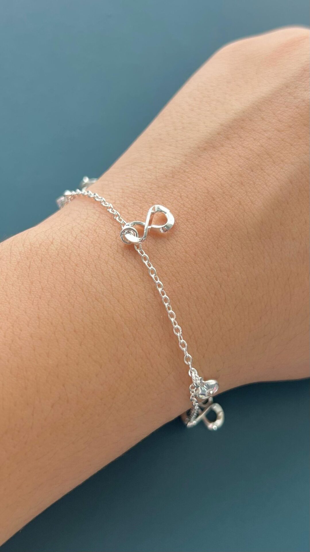 15252710272-whatsapp-image-2024-02-20-at-09-39-06-1-1.jpeg PULSEIRA INFINITO COM ZIRCÔNIA - PRATA 925