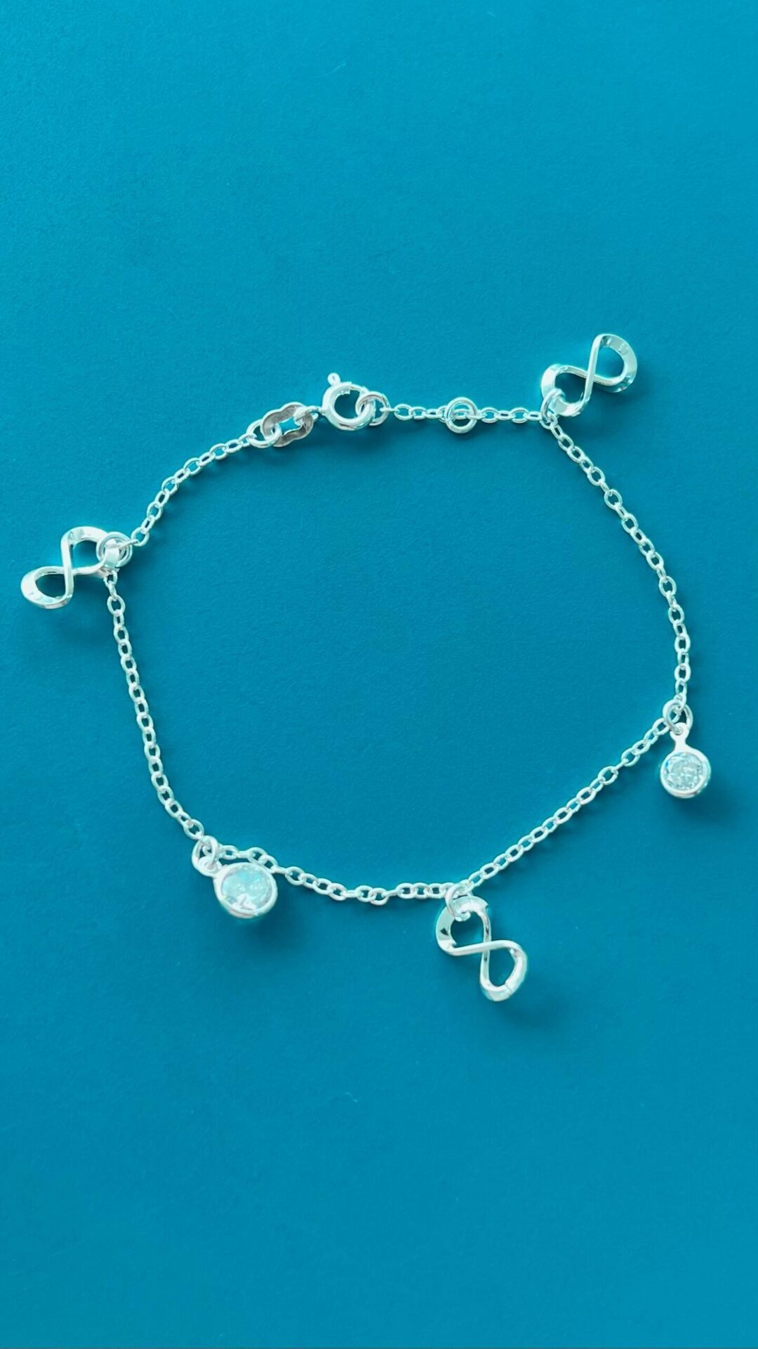 15252710301-whatsapp-image-2024-02-20-at-09-39-07-1.jpeg PULSEIRA INFINITO COM ZIRCÔNIA - PRATA 925