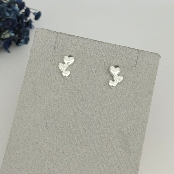 BRINCO CORAÇÃO TRIPLO - PRATA 925