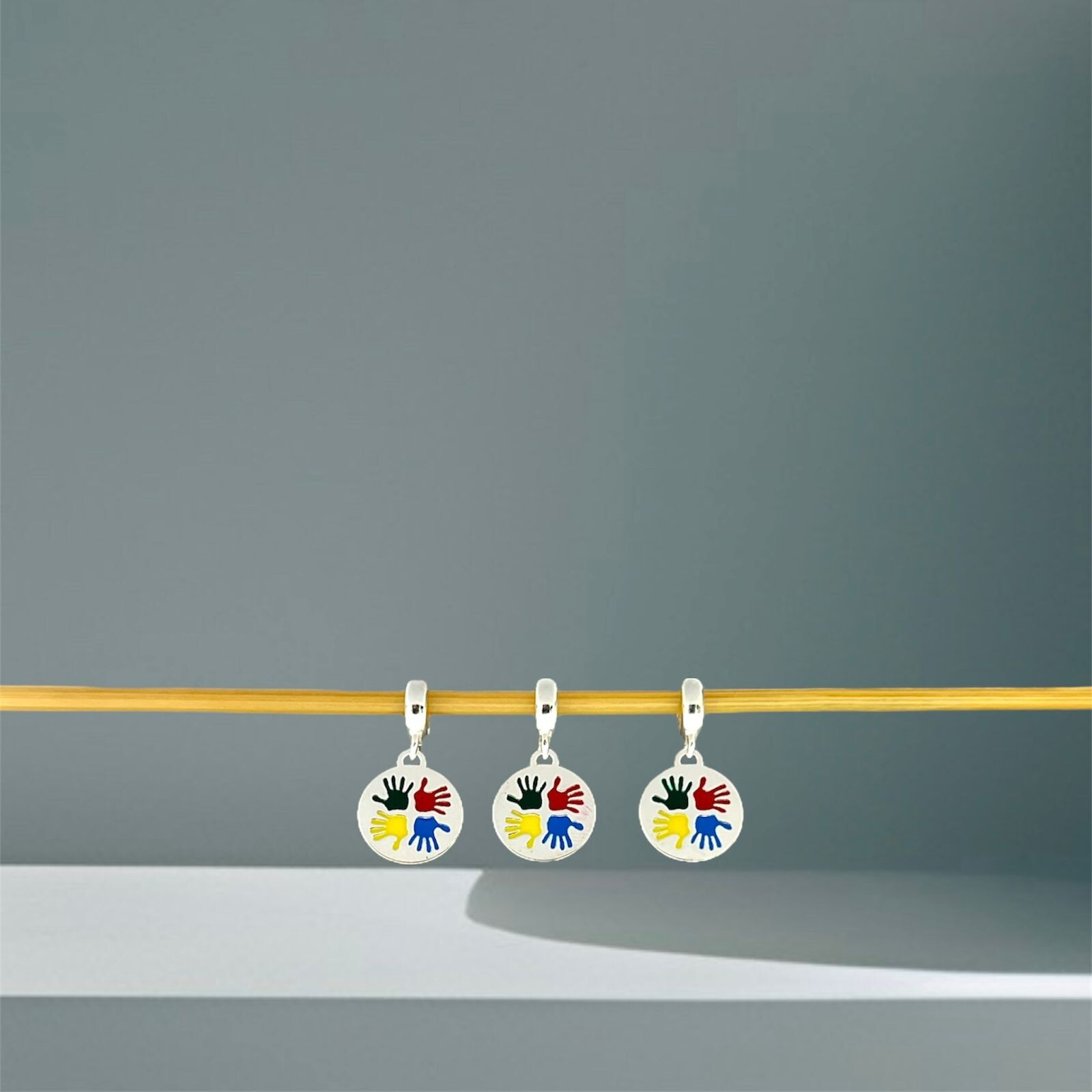 BERLOQUE SÍMBOLO DO AUTISMO / CORTE A LASER - PRATA 925